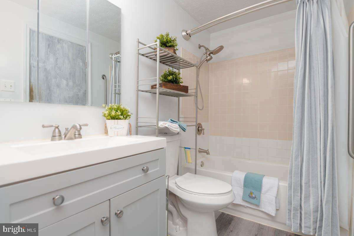 1312 Acorn Ridge Court Edgewood, MD 21040 - Photo 23 of 39 a bathroom with a sink a toilet a mirror and shower