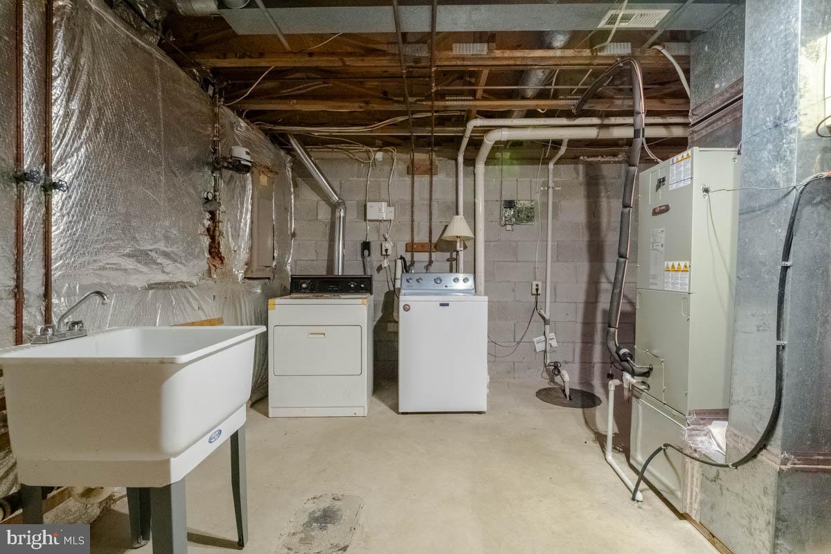 1312 Acorn Ridge Court Edgewood, MD 21040 - Photo 28 of 39 a utility room with dryer and washer