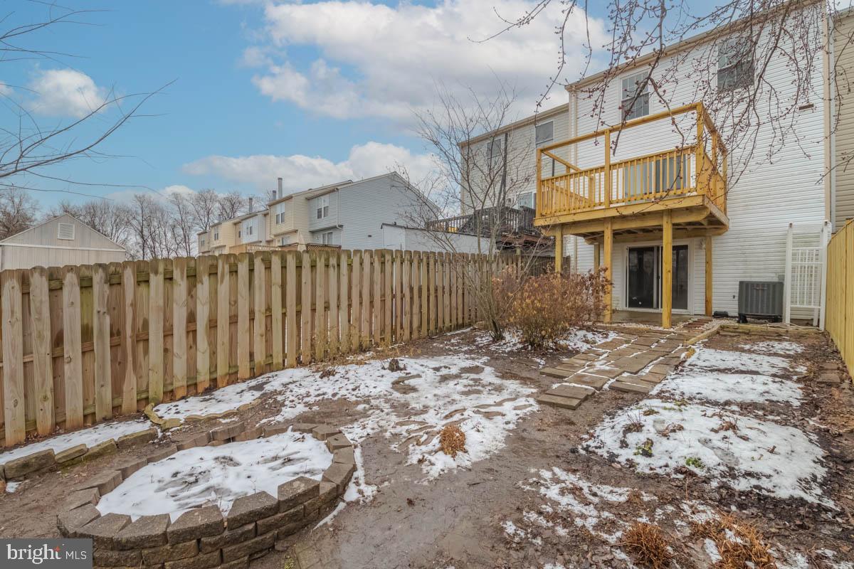 1312 Acorn Ridge Court Edgewood, MD 21040 - Photo 35 of 39 a view of a backyard with wooden fence