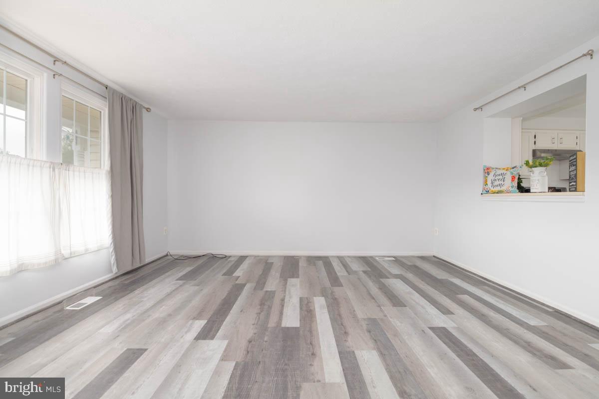 1312 Acorn Ridge Court Edgewood, MD 21040 - Photo 6 of 39 a view of wooden floor and windows in a room
