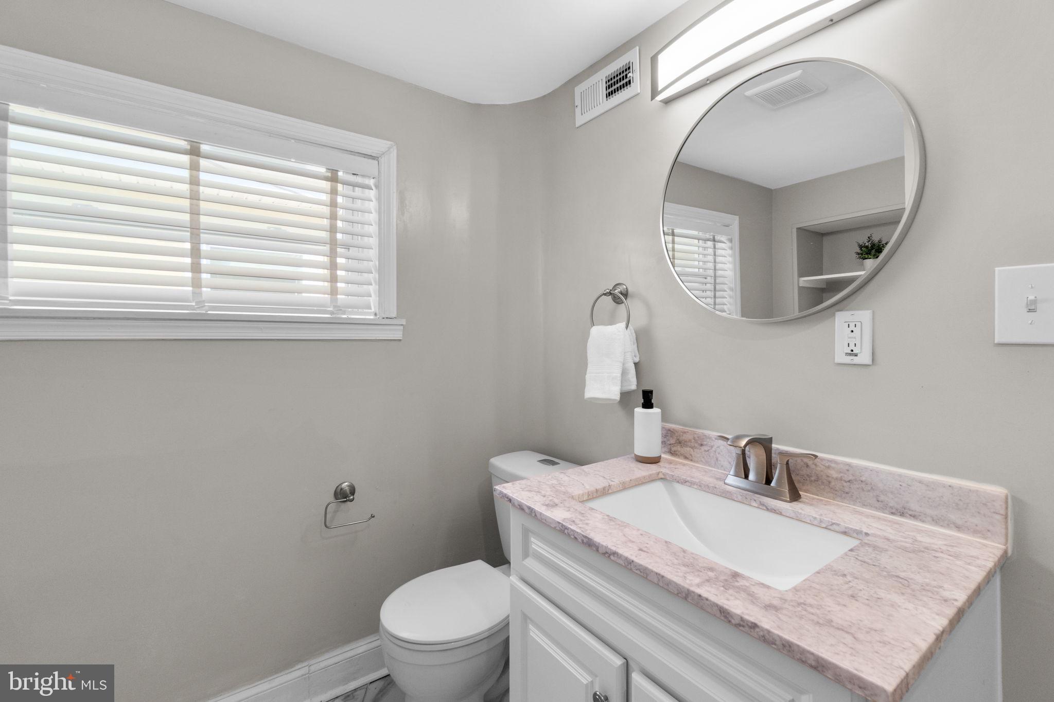 1827 Bank Street Baltimore, MD 21231 - Photo 18 of 31 Modern elegance in a serene bathroom.