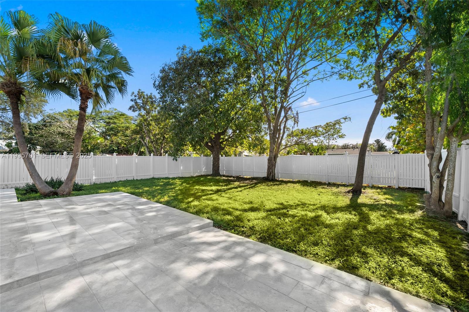 253 Southwest 4th Street Dania Beach, FL 33004 - Photo 23 of 27 a backyard of a house with lots of green space