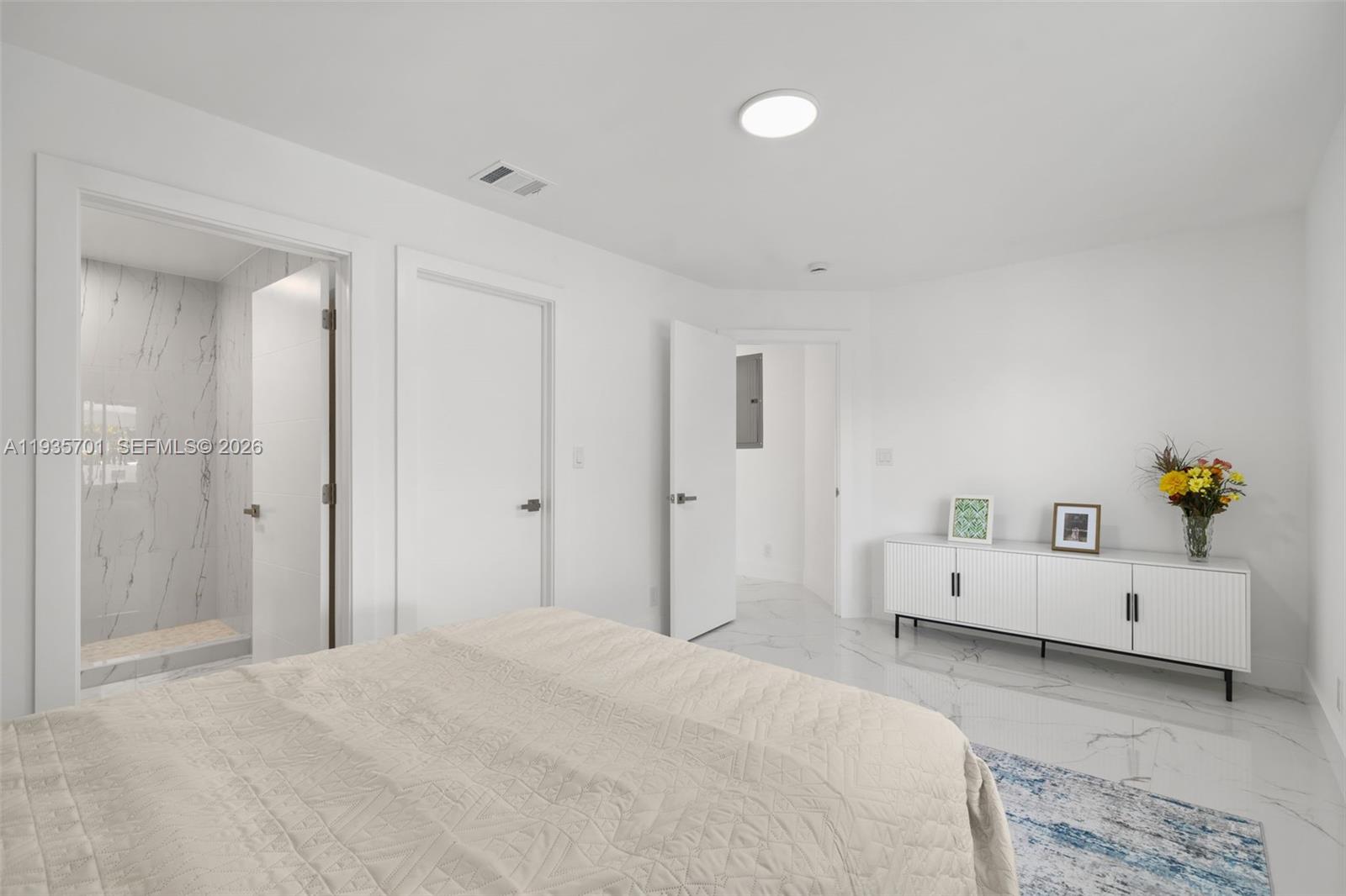 253 Southwest 4th Street Dania Beach, FL 33004 - Photo 8 of 27 a large white bed in a white room