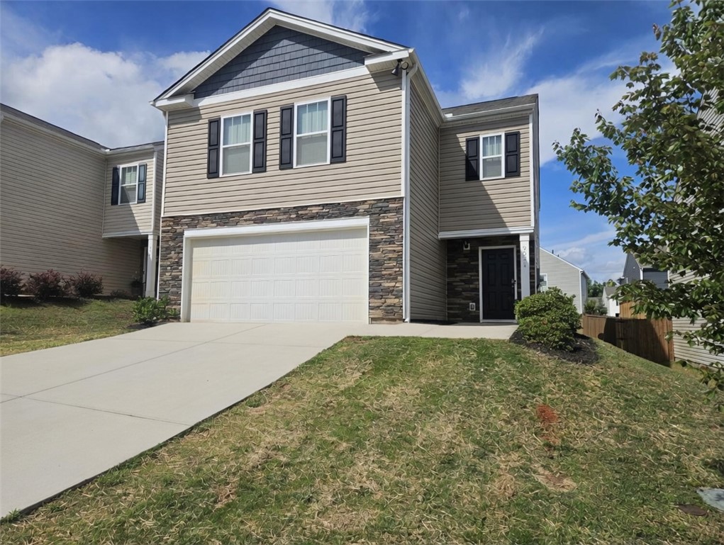 902 Ashwood Lane Easley, SC 29640 - Photo 2 of 39 A well-maintained facade features a mix of siding and stone accents.