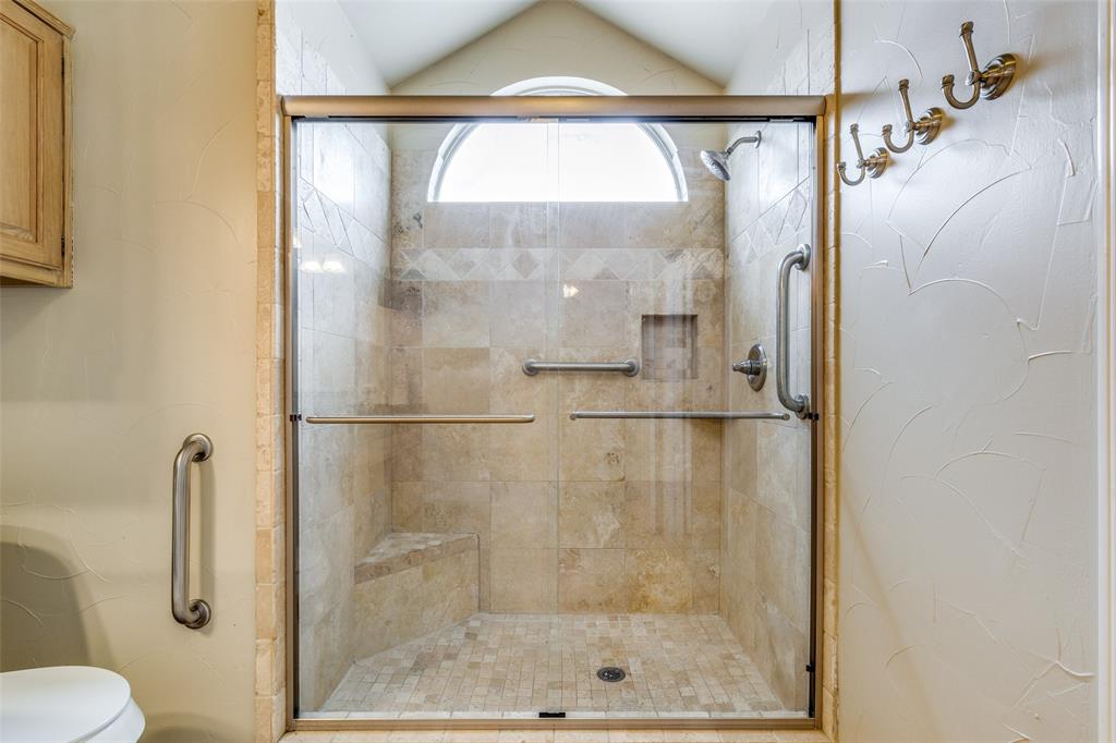 1527 Ranchview Lane Carrollton, TX 75007 - Photo 22 of 25 large walk in shower with seat