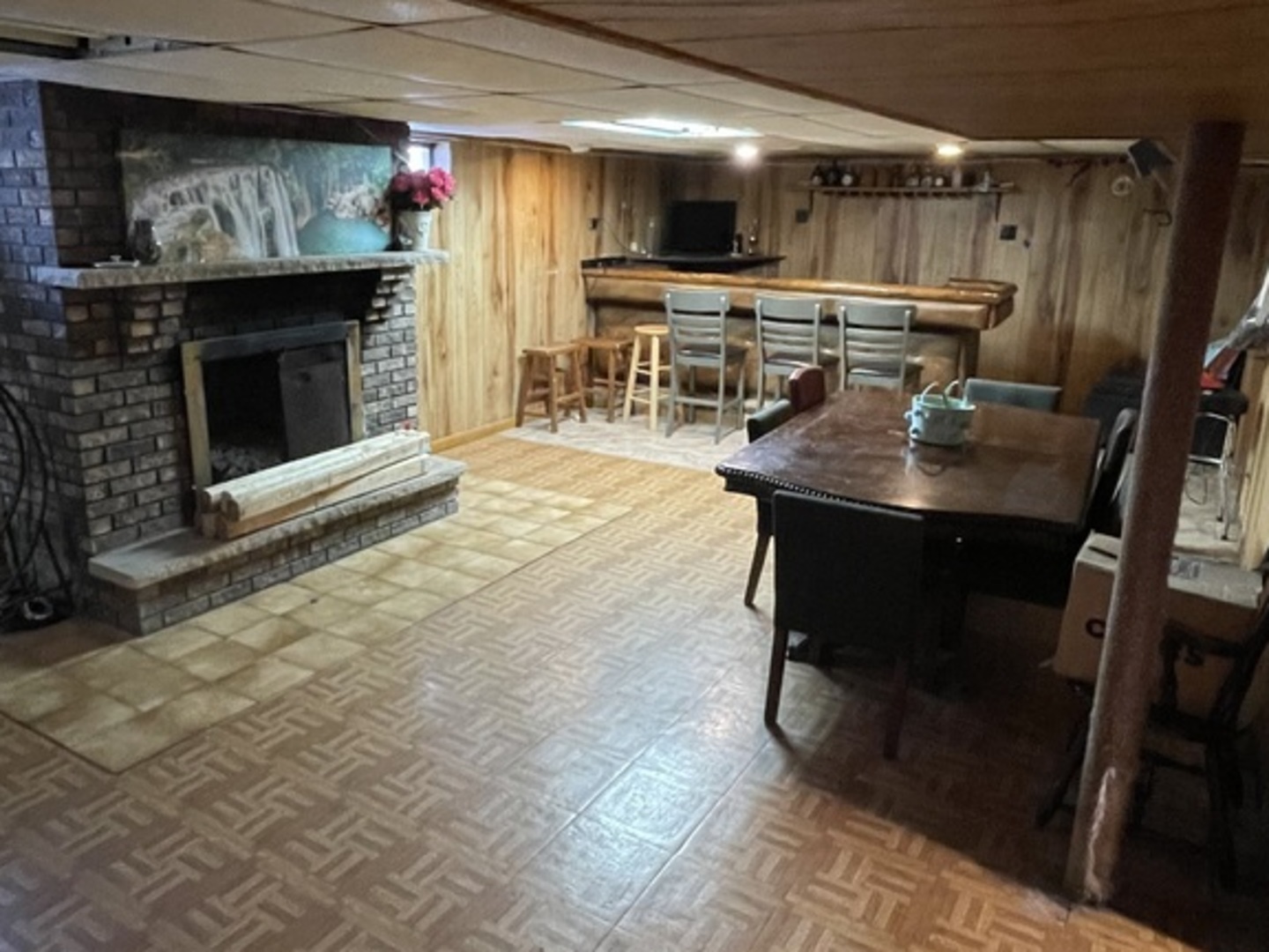 14540 Kolin Avenue Midlothian, IL 60445 - Photo 16 of 24 a kitchen with stainless steel appliances kitchen island granite countertop a table chairs and a refrigerator