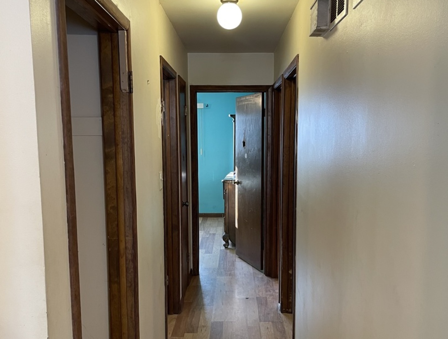14540 Kolin Avenue Midlothian, IL 60445 - Photo 8 of 24 a view of a hallway with wooden floor