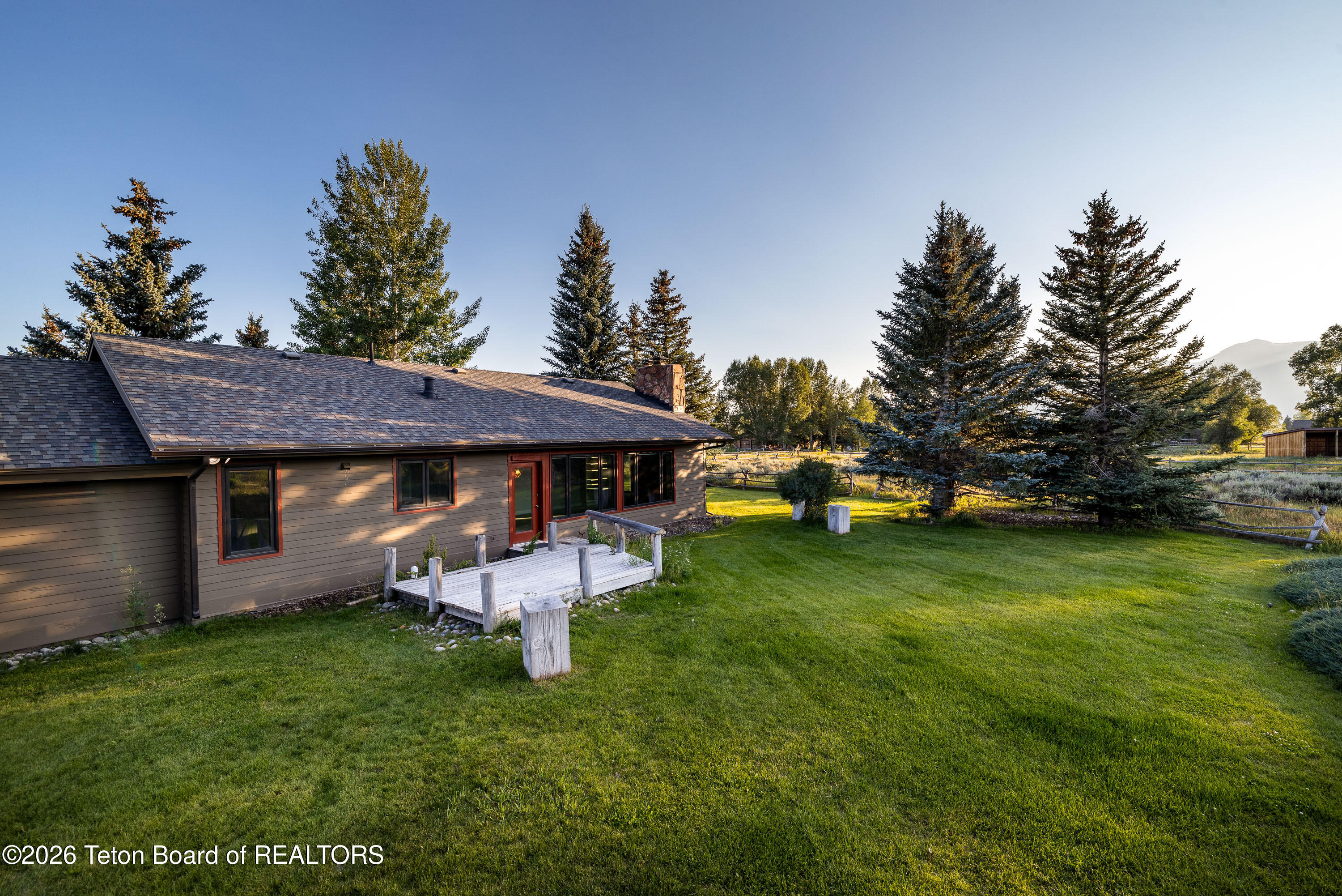 275 East Moulton Loop Road Jackson, WY 83001 - Photo 24 of 27 Back Deck & Yard