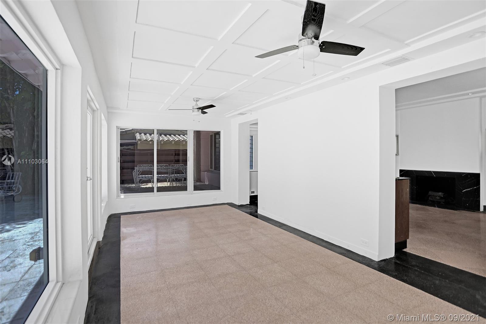 4431 Alton Road Miami Beach, FL 33140 - Photo 20 of 58 a view of an empty room with a window