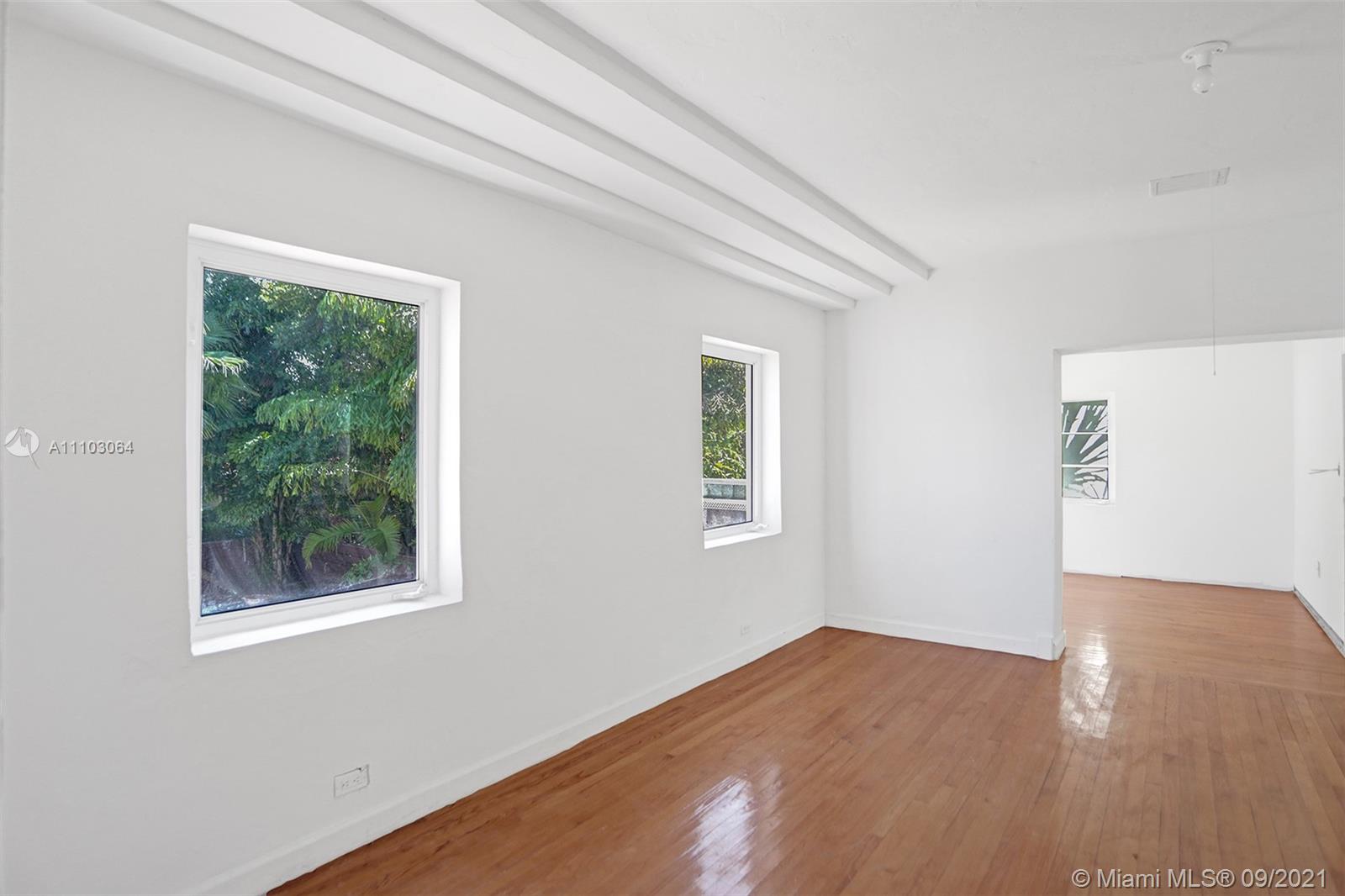 4431 Alton Road Miami Beach, FL 33140 - Photo 26 of 58 an empty room with a window
