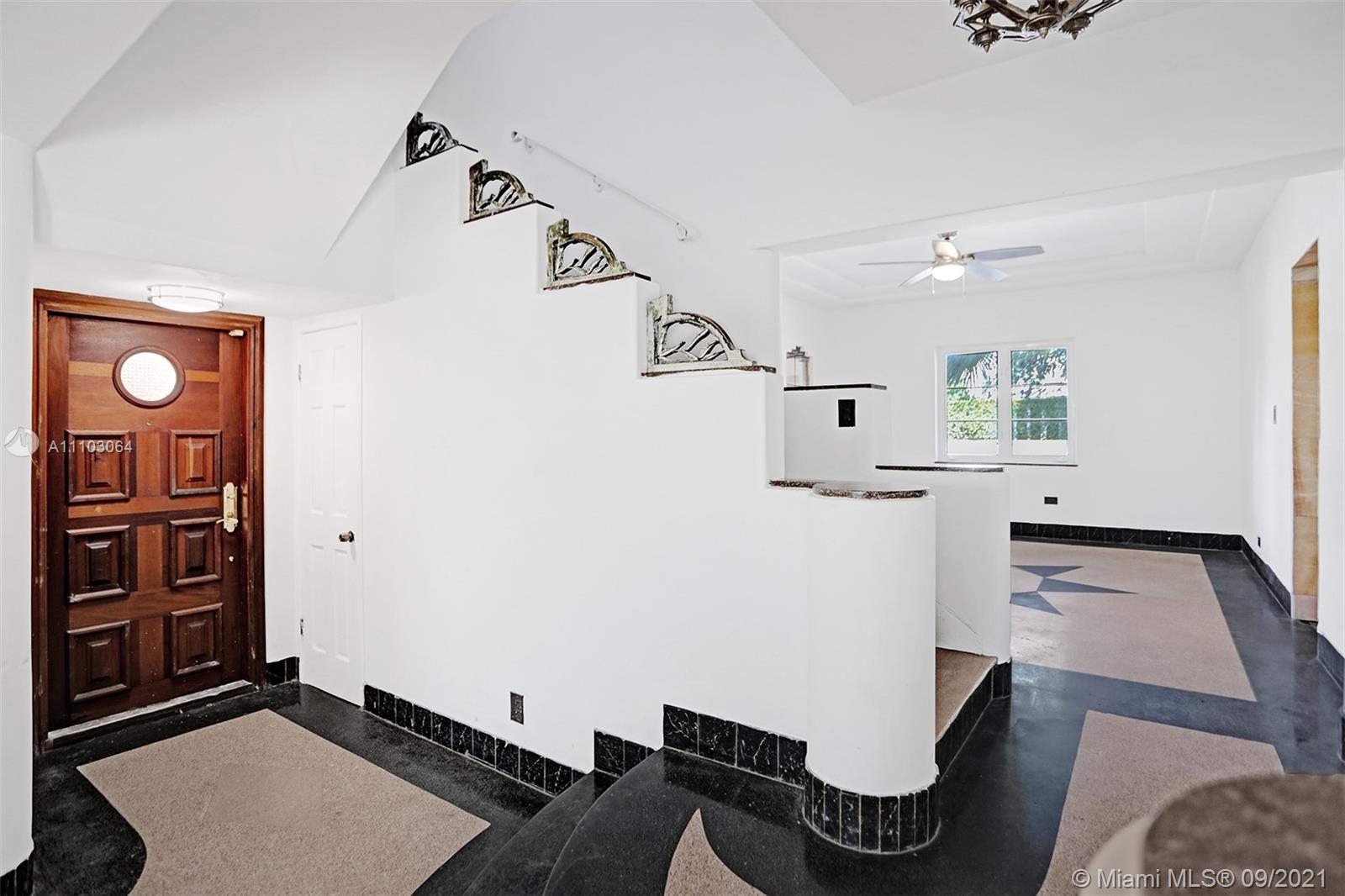 4431 Alton Road Miami Beach, FL 33140 - Photo 5 of 58 a living room with furniture and wooden floor