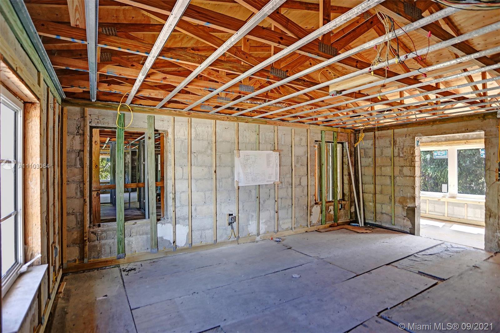 4431 Alton Road Miami Beach, FL 33140 - Photo 45 of 58 a view of a room with wooden walls