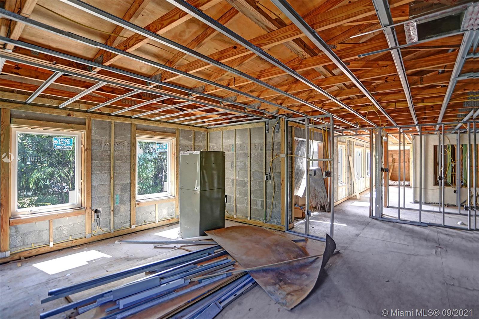 4431 Alton Road Miami Beach, FL 33140 - Photo 51 of 58 a outdoor space with wooden floor and windows