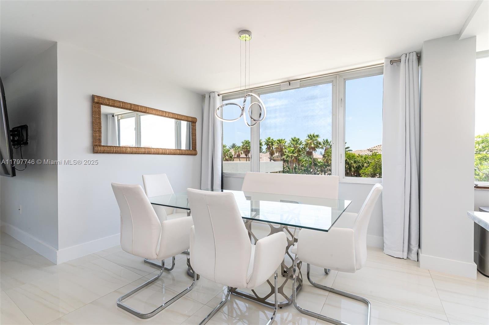 3912 South Ocean Boulevard, Unit 306 Highland Beach, FL 33487 - Photo 2 of 25 a view of a dining room with furniture window and outside view