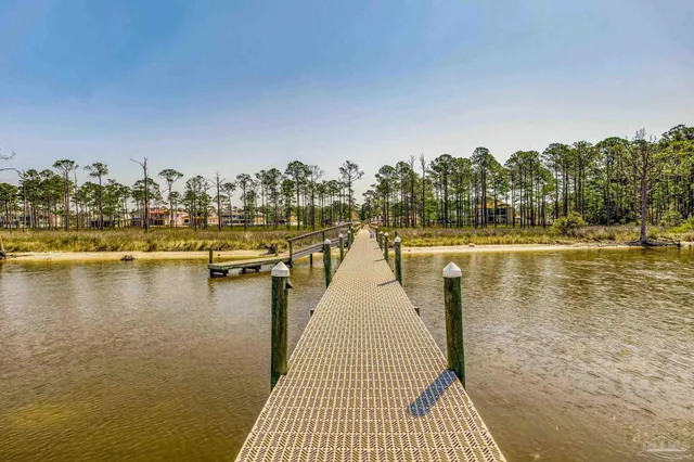 a terrace with outdoor seating and city view