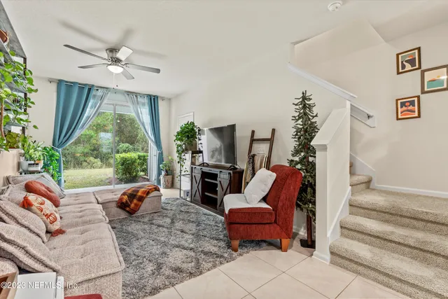 a outdoor living space with furniture and a fireplace