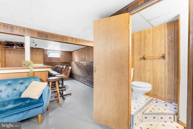 a living room with a couch and a table