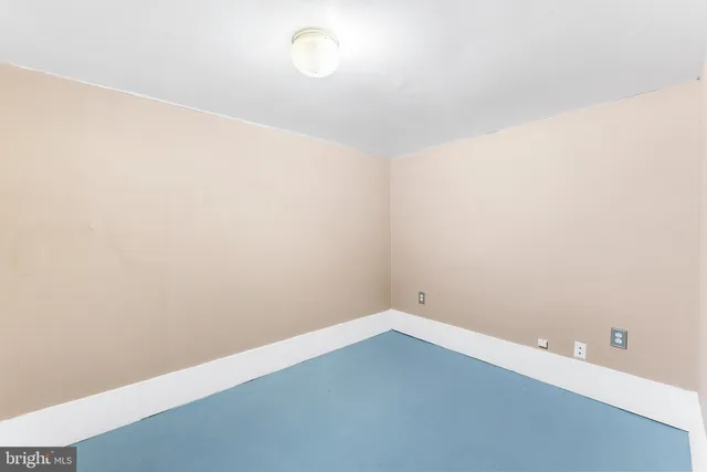 an empty room with a workbench