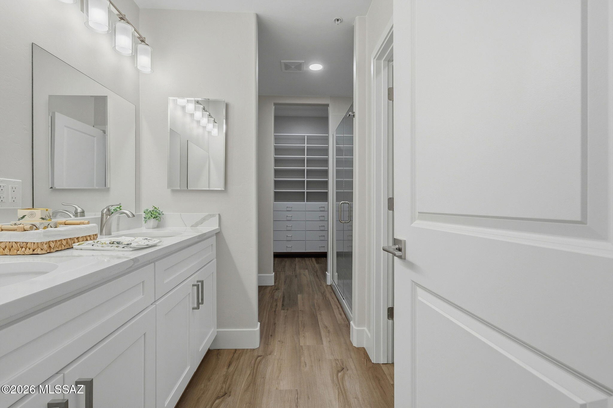 2022 East River Road, Unit 102 Tucson, AZ 85718 - Photo 16 of 21 Primary Bathroom Toward Closet