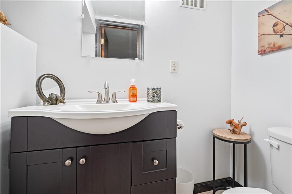 216 Hillendale Road Pittsburgh, PA 15237 - Photo 17 of 25 a bathroom with a sink and a mirror