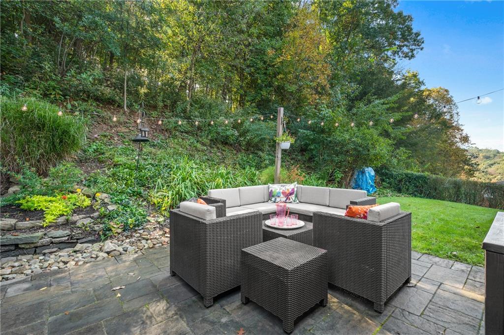 216 Hillendale Road Pittsburgh, PA 15237 - Photo 20 of 25 a view of a house with a backyard and a patio