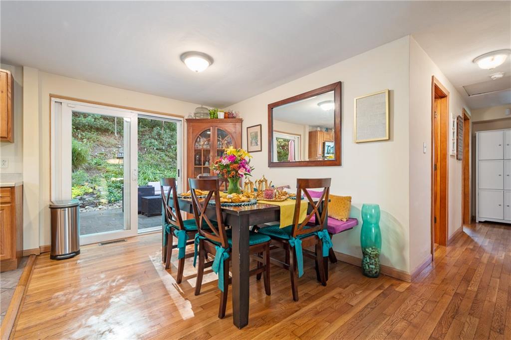 216 Hillendale Road Pittsburgh, PA 15237 - Photo 6 of 25 a view of a dining room with furniture and wooden floor