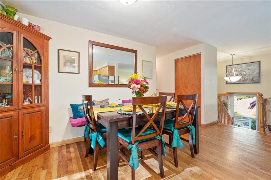 216 Hillendale Road Pittsburgh, PA 15237 - Photo 7 of 25 a view of a dining room with furniture and wooden floor