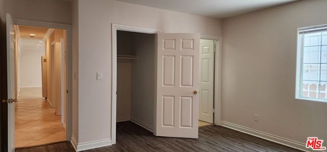 a view of front door with wooden floor
