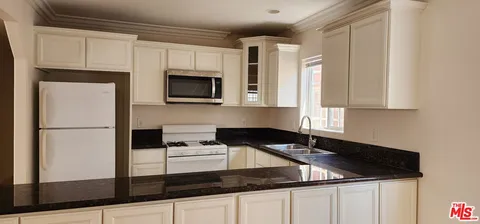 $1,125,000 | 1873 West Jefferson Boulevard, Los Angeles, CA 90018