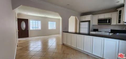 $1,125,000 | 1873 West Jefferson Boulevard, Los Angeles, CA 90018