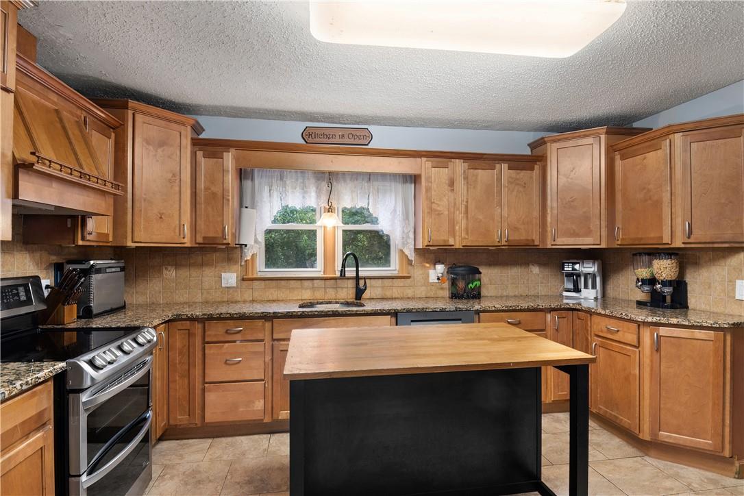 36 Secor Road Mahopac, NY 10541 - Photo 1 of 1 Kitchen: maple cabinets with granite counters and tiled floors.