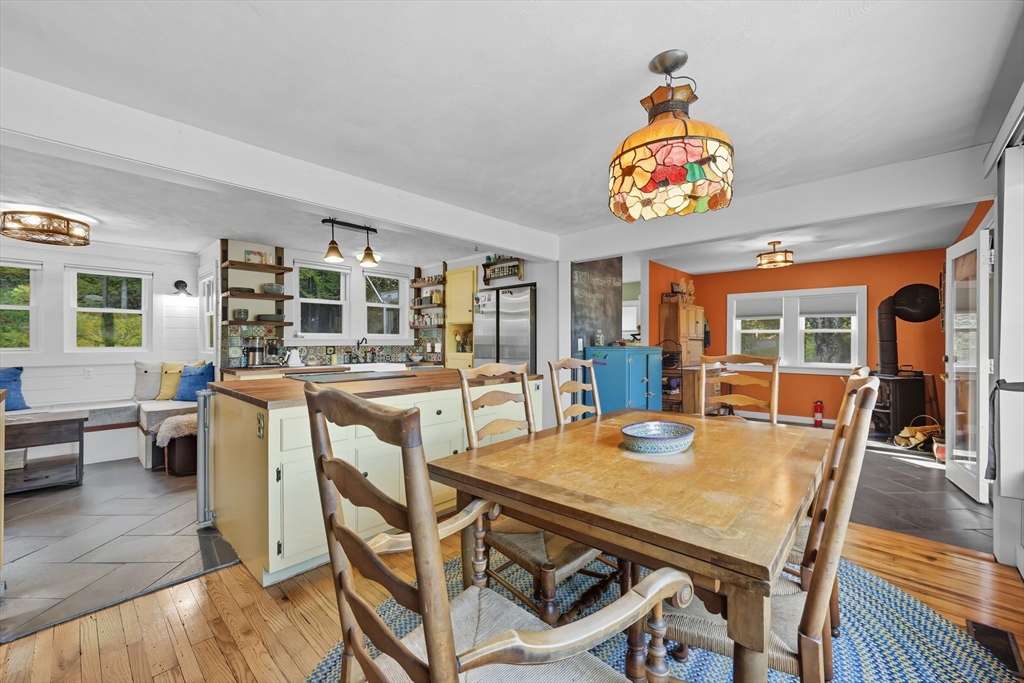 376 NW Road Westhampton, MA 01027 - Photo 15 of 41 a view of a dining room with furniture wooden floor and chandelier