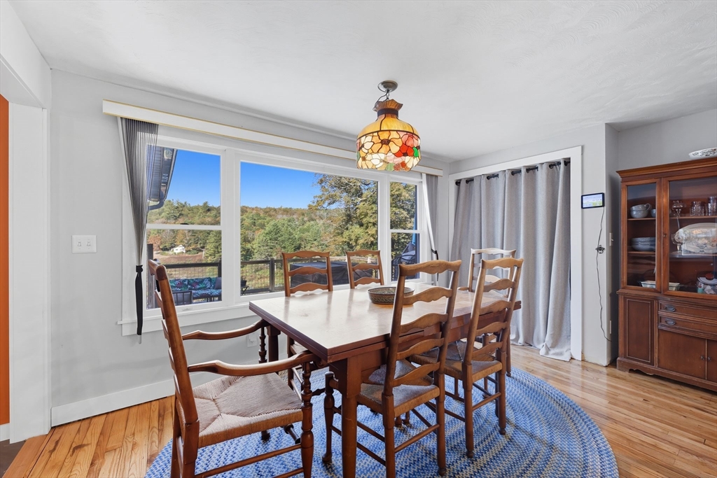376 NW Road Westhampton, MA 01027 - Photo 17 of 41 a view of a dining room with furniture window and wooden floor