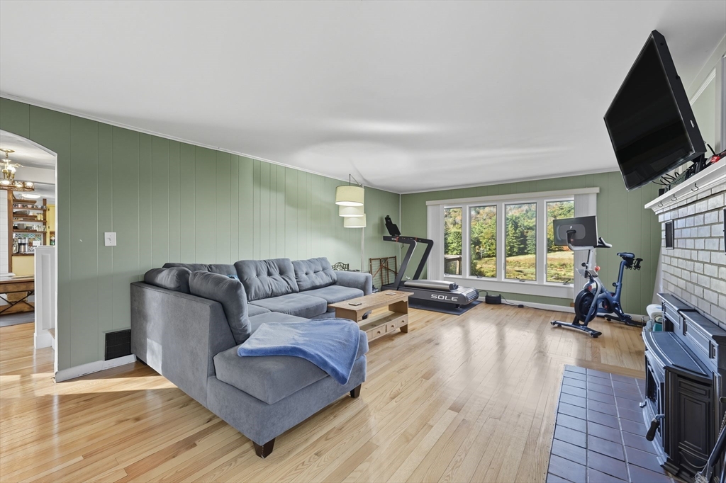 376 NW Road Westhampton, MA 01027 - Photo 24 of 41 a living room with furniture and a flat screen tv