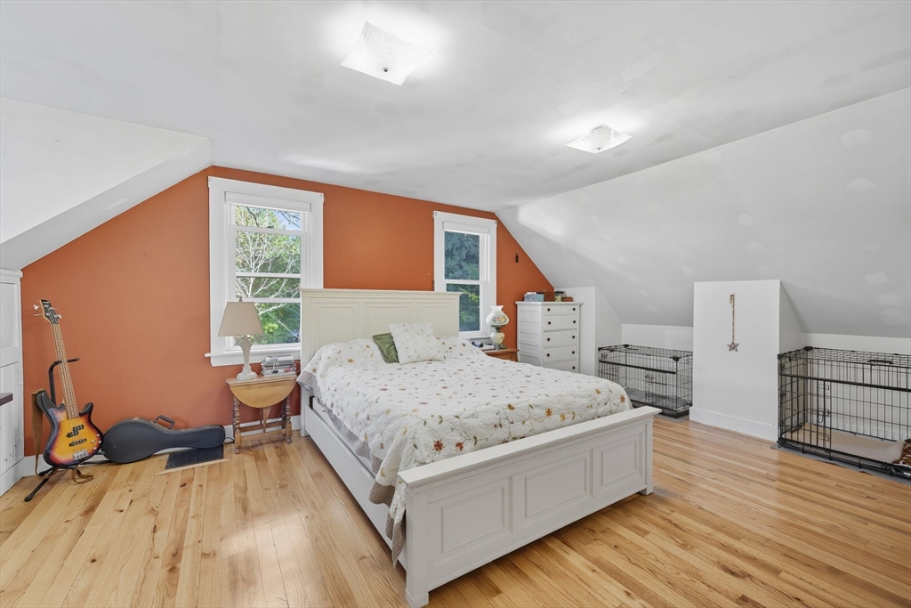 376 NW Road Westhampton, MA 01027 - Photo 30 of 41 a bedroom with a bed and wooden floor