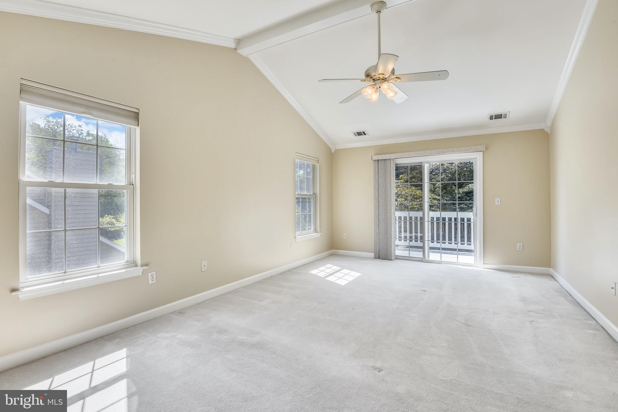 2691 Carrollton Road Annapolis, MD 21403 - Photo 14 of 42 Master bedroom-vaulted ceiling and balcony