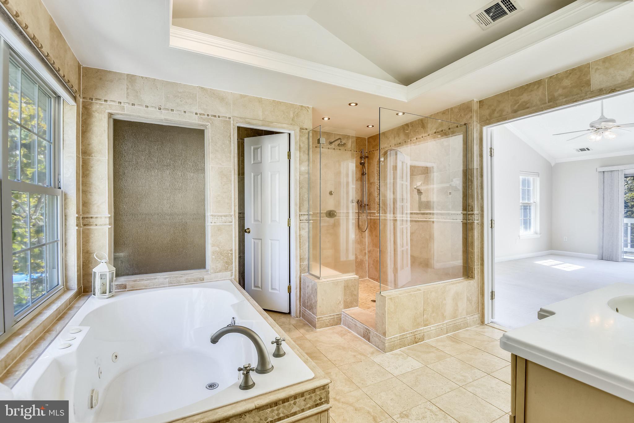 2691 Carrollton Road Annapolis, MD 21403 - Photo 17 of 42 Master bath-large glass enclosed shower and tub