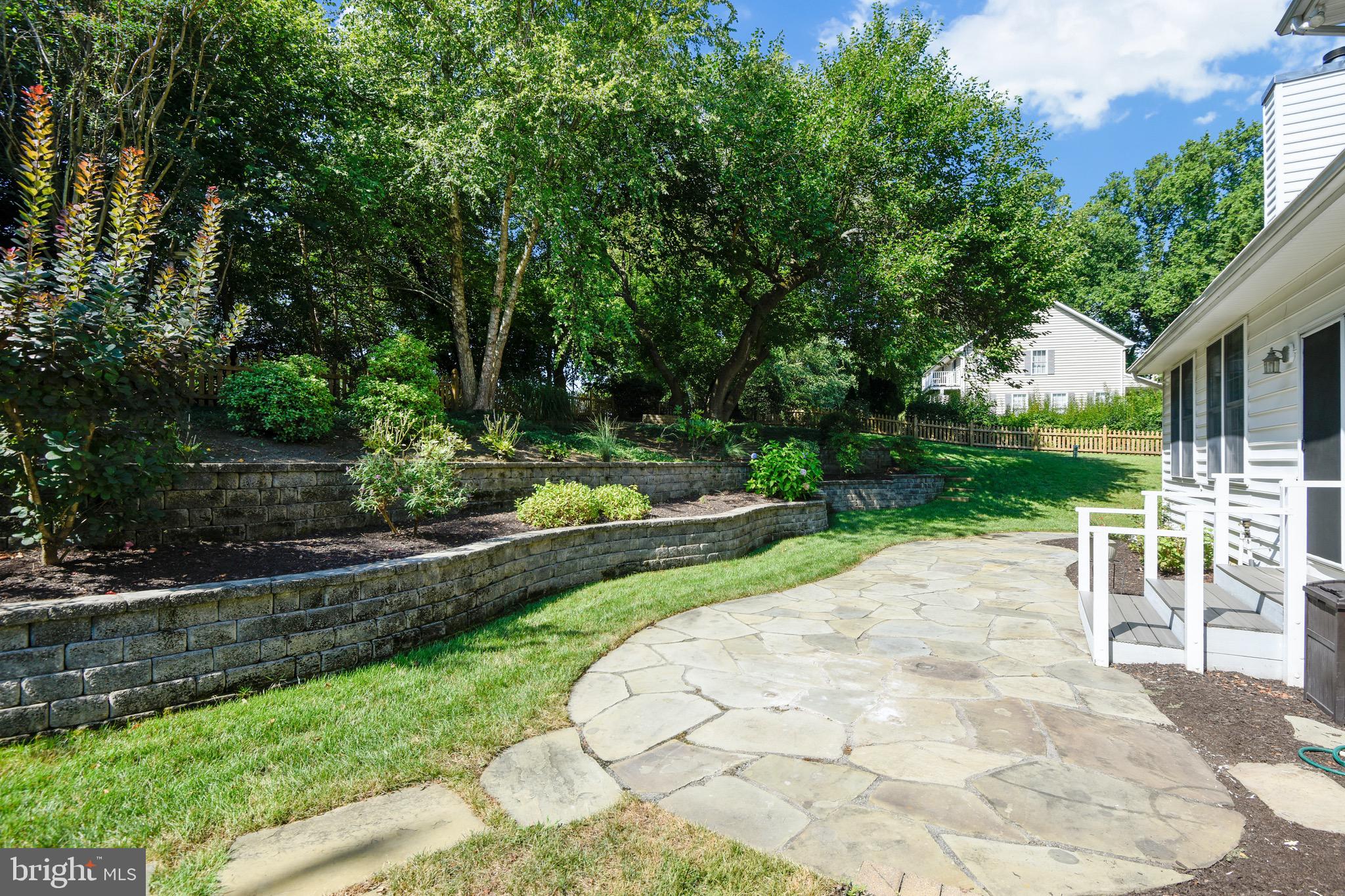 2691 Carrollton Road Annapolis, MD 21403 - Photo 21 of 42 Stone patio/retaining walls, mature landscaping