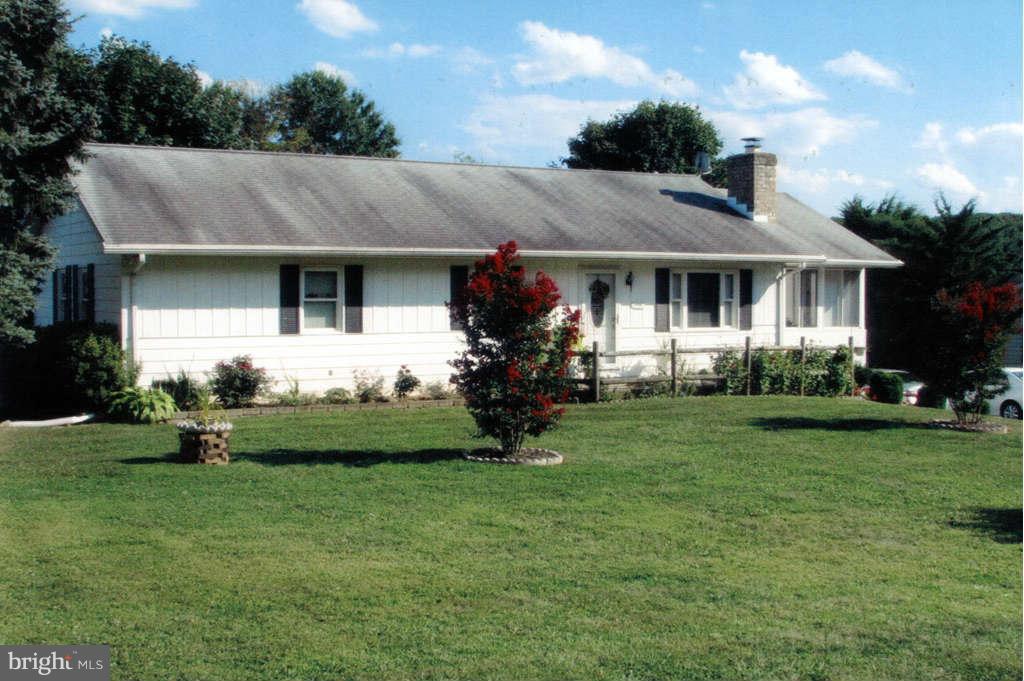 4519 Foxtail Road Hampstead, MD 21074 - Photo 2 of 29 a front view of house with yard and green space