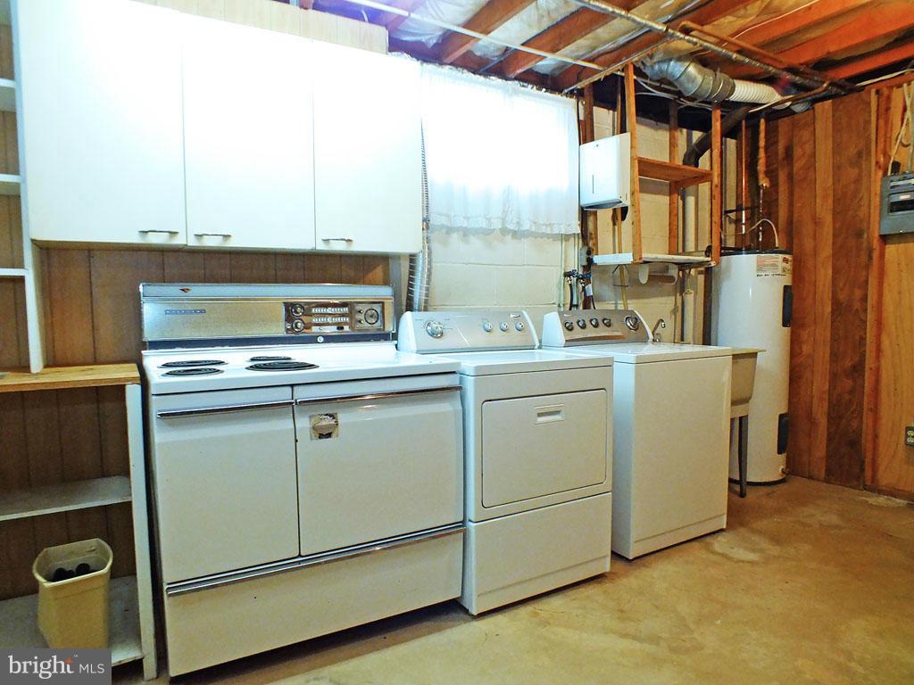 4519 Foxtail Road Hampstead, MD 21074 - Photo 20 of 29 a utility room with dryer and washer