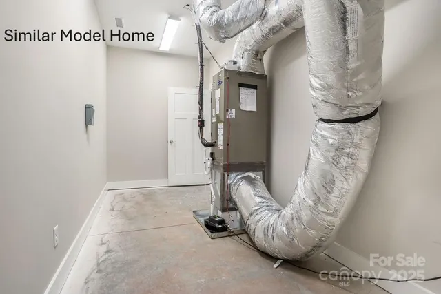 a view of a roof deck with couches and potted plants