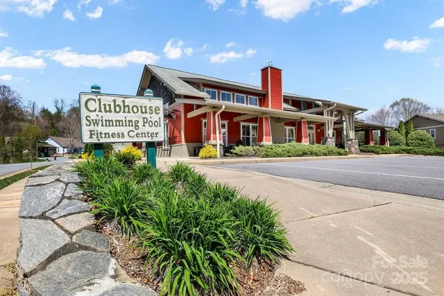 an aerial view of a house with swimming pool