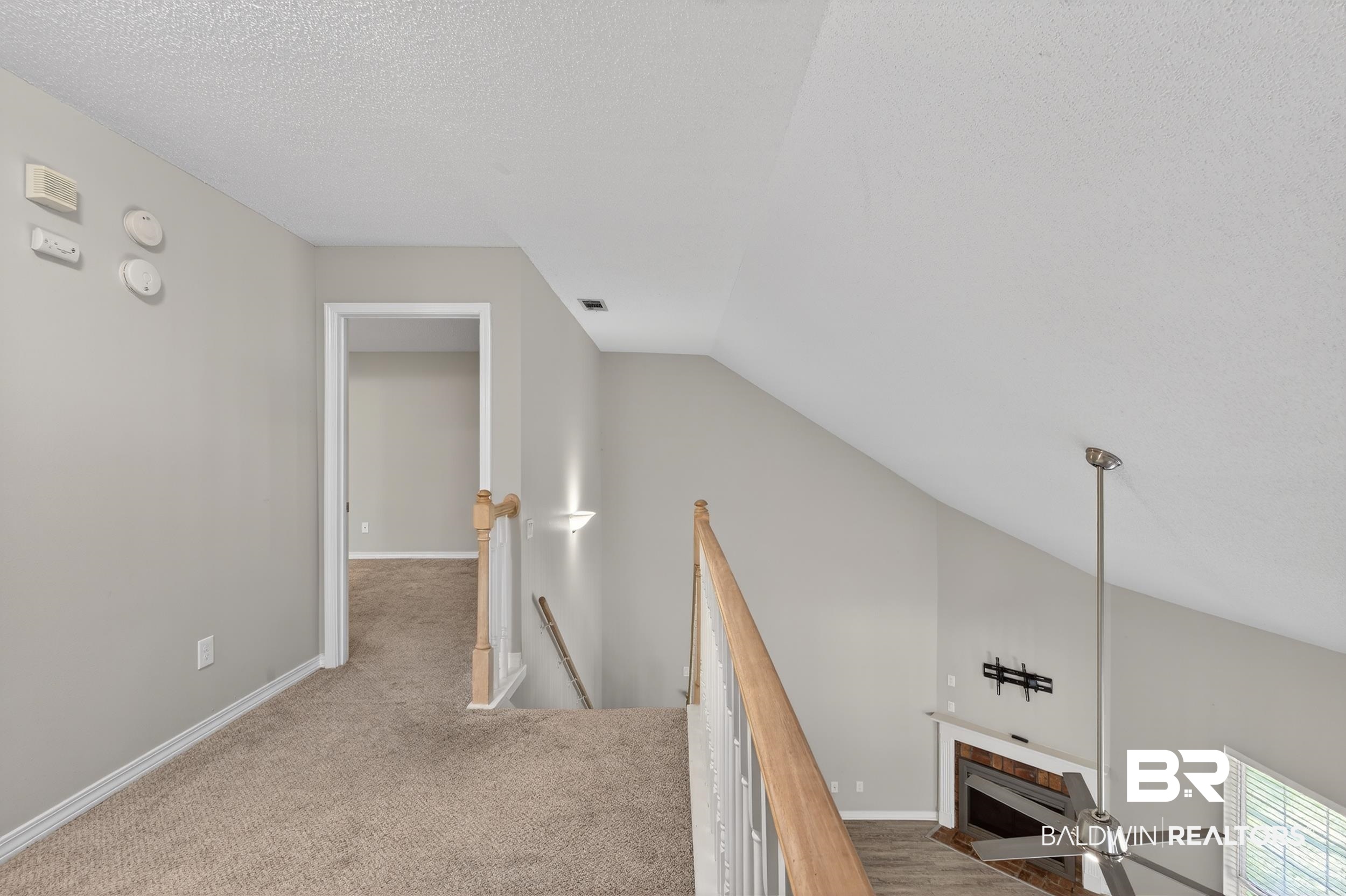 7050 Highpointe Place West Daphne, AL 36527 - Photo 58 of 66 Hall featuring an upstairs landing and light colored carpet