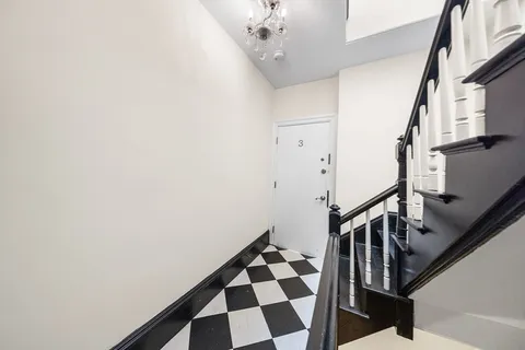 a view of entryway with stairs