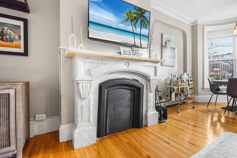 a bedroom with a bed and a table