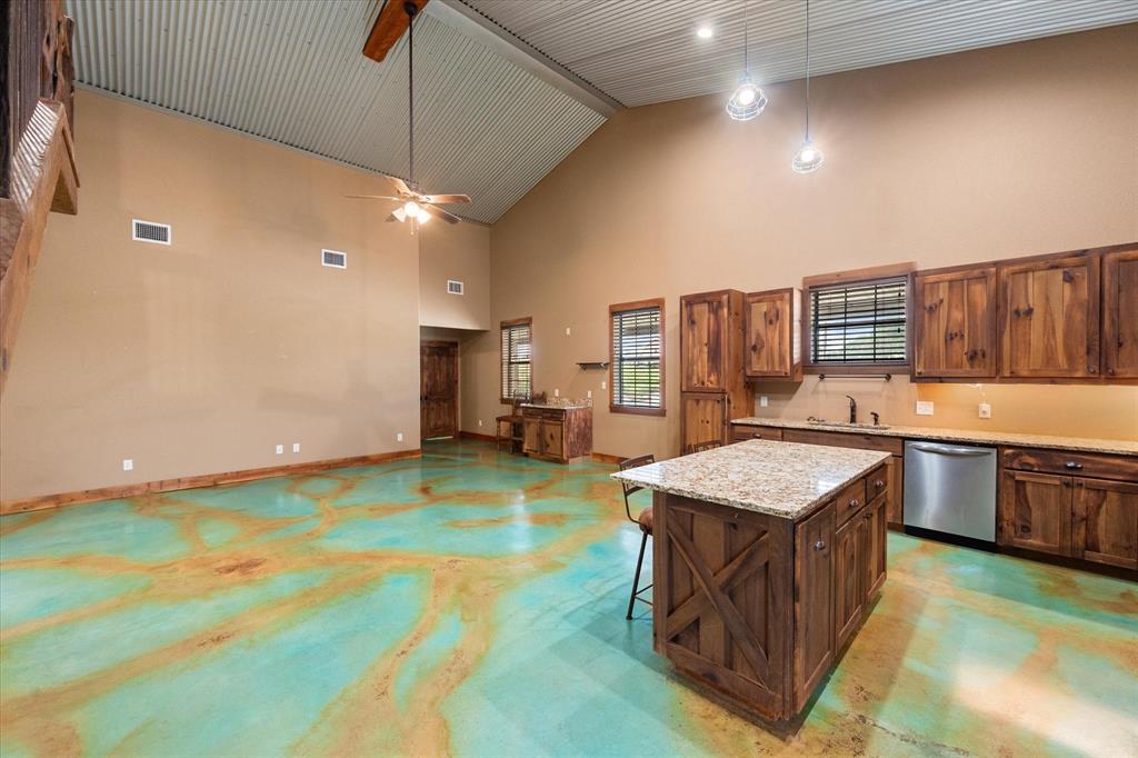 845 North Cardinal Road Azle, TX 76020 - Photo 5 of 37 Open kitchen living with stained concrete floors