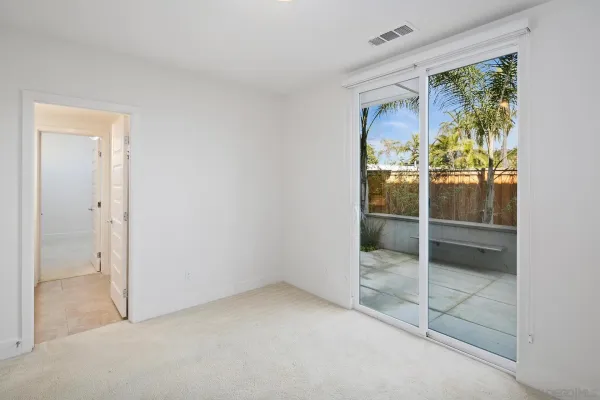 a view of an empty room and window