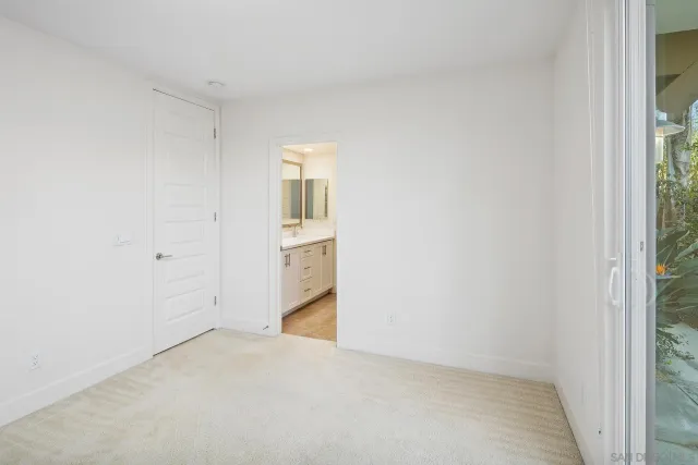 a view of balcony with furniture