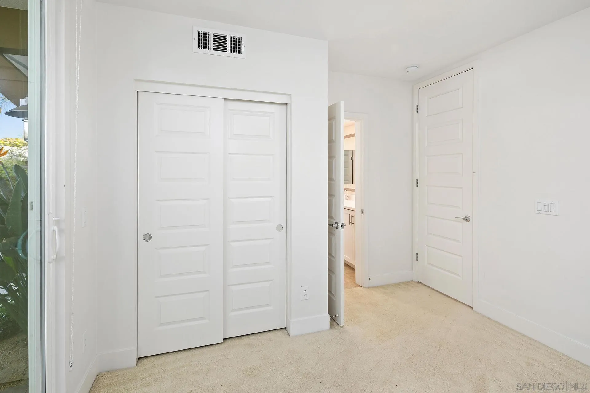 1935 North Vulcan Avenue Encinitas, CA 92024 - Photo 19 of 22 an empty room with closet area