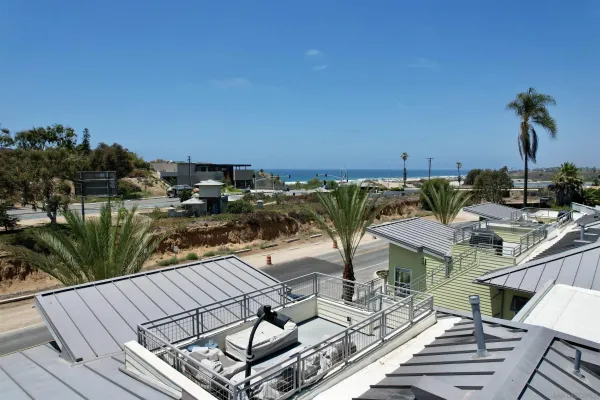 a view of a balcony with chairs